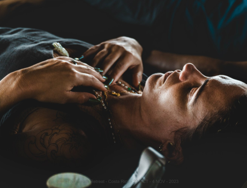 Individual breathwork session showing person in relaxed meditative state